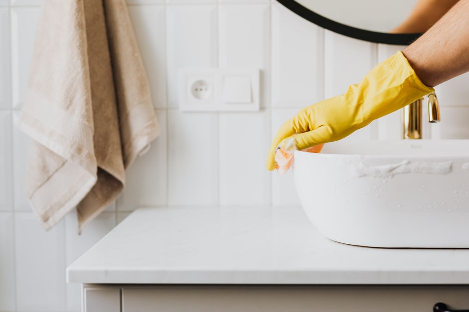 Detailed cleaning of a modern bathroom sink